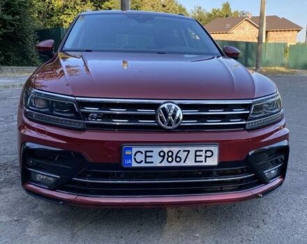 Красный Фольксваген Тигуан, объемом двигателя 2 л и пробегом 282 тыс. км за 26000 $, фото 2 на Automoto.ua