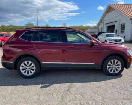 Червоний Фольксваген Тігуан, об'ємом двигуна 2 л та пробігом 49 тис. км за 9850 $, фото 3 на Automoto.ua