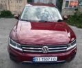 Красный Фольксваген Тигуан, объемом двигателя 1.98 л и пробегом 113 тыс. км за 16500 $, фото 1 на Automoto.ua