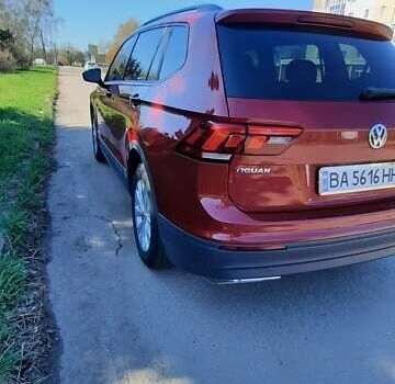 Червоний Фольксваген Тігуан, об'ємом двигуна 1.98 л та пробігом 124 тис. км за 22500 $, фото 12 на Automoto.ua