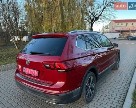 Красный Фольксваген Тигуан, объемом двигателя 2 л и пробегом 115 тыс. км за 20500 $, фото 1 на Automoto.ua
