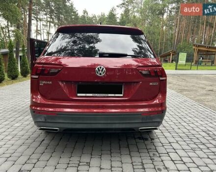 Червоний Фольксваген Тігуан, об'ємом двигуна 1.98 л та пробігом 140 тис. км за 17499 $, фото 6 на Automoto.ua