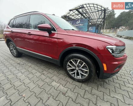 Красный Фольксваген Тигуан, объемом двигателя 1.98 л и пробегом 150 тыс. км за 19200 $, фото 1 на Automoto.ua