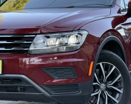 Червоний Фольксваген Тігуан, об'ємом двигуна 2 л та пробігом 99 тис. км за 20800 $, фото 2 на Automoto.ua