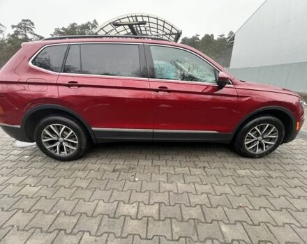 Красный Фольксваген Тигуан, объемом двигателя 2 л и пробегом 150 тыс. км за 19300 $, фото 4 на Automoto.ua