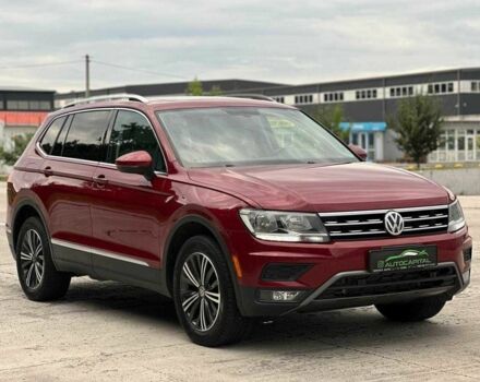 Красный Фольксваген Тигуан, объемом двигателя 2 л и пробегом 145 тыс. км за 20990 $, фото 1 на Automoto.ua