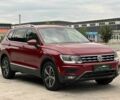 Красный Фольксваген Тигуан, объемом двигателя 2 л и пробегом 145 тыс. км за 20990 $, фото 1 на Automoto.ua