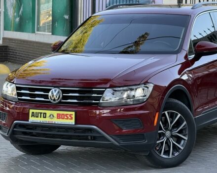 Червоний Фольксваген Тігуан, об'ємом двигуна 2 л та пробігом 99 тис. км за 20800 $, фото 4 на Automoto.ua
