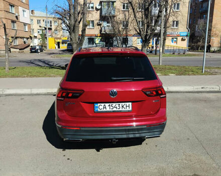 Червоний Фольксваген Тігуан, об'ємом двигуна 1.98 л та пробігом 62 тис. км за 23000 $, фото 2 на Automoto.ua