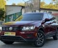 Червоний Фольксваген Тігуан, об'ємом двигуна 2 л та пробігом 99 тис. км за 20800 $, фото 1 на Automoto.ua