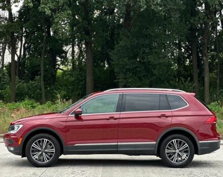 Красный Фольксваген Тигуан, объемом двигателя 2 л и пробегом 145 тыс. км за 20990 $, фото 3 на Automoto.ua