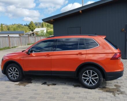 Червоний Фольксваген Тігуан, об'ємом двигуна 2 л та пробігом 104 тис. км за 16200 $, фото 1 на Automoto.ua