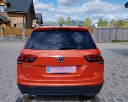 Червоний Фольксваген Тігуан, об'ємом двигуна 2 л та пробігом 104 тис. км за 16200 $, фото 2 на Automoto.ua