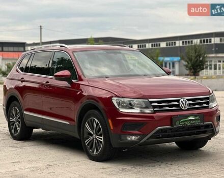 Красный Фольксваген Тигуан, объемом двигателя 2 л и пробегом 145 тыс. км за 19990 $, фото 3 на Automoto.ua