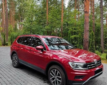 Червоний Фольксваген Тігуан, об'ємом двигуна 1.98 л та пробігом 140 тис. км за 17499 $, фото 1 на Automoto.ua