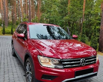 Червоний Фольксваген Тігуан, об'ємом двигуна 1.98 л та пробігом 140 тис. км за 17499 $, фото 3 на Automoto.ua