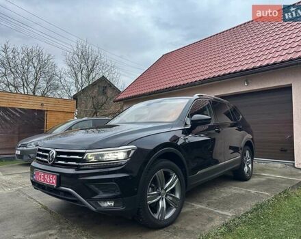 Красный Фольксваген Тигуан, объемом двигателя 2.03 л и пробегом 218 тыс. км за 27950 $, фото 9 на Automoto.ua