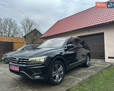 Красный Фольксваген Тигуан, объемом двигателя 2.03 л и пробегом 218 тыс. км за 27950 $, фото 4 на Automoto.ua