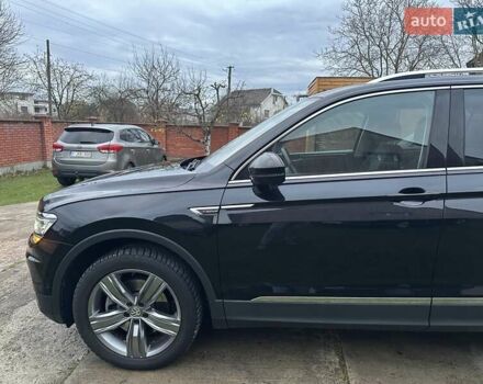 Красный Фольксваген Тигуан, объемом двигателя 2.03 л и пробегом 218 тыс. км за 27950 $, фото 28 на Automoto.ua