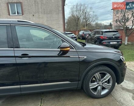 Красный Фольксваген Тигуан, объемом двигателя 2.03 л и пробегом 218 тыс. км за 27950 $, фото 25 на Automoto.ua