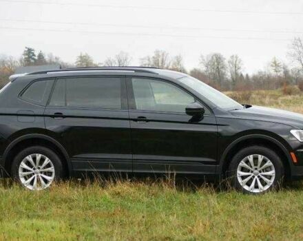 Красный Фольксваген Тигуан, объемом двигателя 2 л и пробегом 35 тыс. км за 13200 $, фото 4 на Automoto.ua