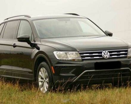 Красный Фольксваген Тигуан, объемом двигателя 2 л и пробегом 35 тыс. км за 13200 $, фото 1 на Automoto.ua