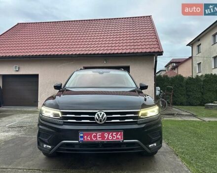 Красный Фольксваген Тигуан, объемом двигателя 2.03 л и пробегом 218 тыс. км за 27950 $, фото 5 на Automoto.ua