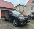 Красный Фольксваген Тигуан, объемом двигателя 2.03 л и пробегом 218 тыс. км за 27950 $, фото 15 на Automoto.ua