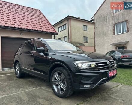 Красный Фольксваген Тигуан, объемом двигателя 2.03 л и пробегом 218 тыс. км за 27950 $, фото 12 на Automoto.ua