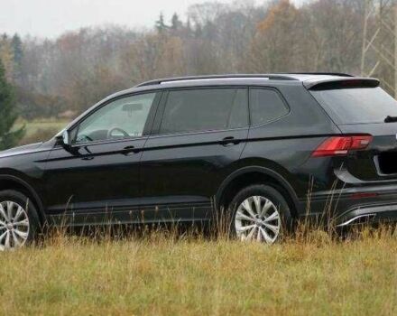 Красный Фольксваген Тигуан, объемом двигателя 2 л и пробегом 35 тыс. км за 13200 $, фото 2 на Automoto.ua