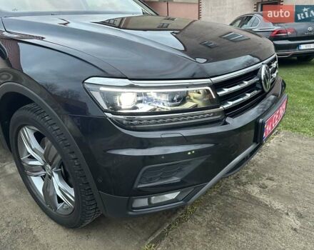 Красный Фольксваген Тигуан, объемом двигателя 2.03 л и пробегом 218 тыс. км за 27950 $, фото 16 на Automoto.ua