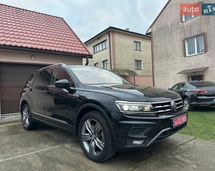 Красный Фольксваген Тигуан, объемом двигателя 2.03 л и пробегом 218 тыс. км за 27950 $, фото 11 на Automoto.ua