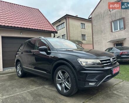 Красный Фольксваген Тигуан, объемом двигателя 2.03 л и пробегом 218 тыс. км за 27950 $, фото 7 на Automoto.ua