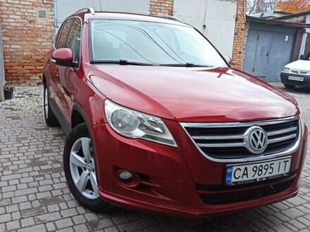 Червоний Фольксваген Тігуан, об'ємом двигуна 1.98 л та пробігом 270 тис. км за 9000 $, фото 1 на Automoto.ua
