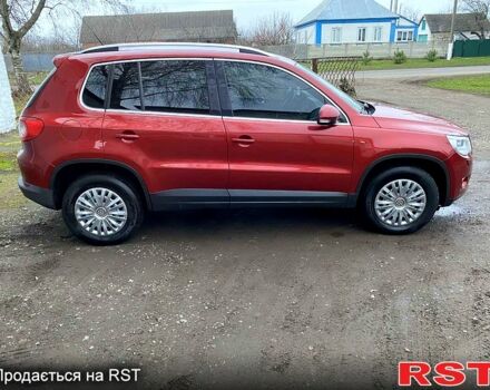 Червоний Фольксваген Тігуан, об'ємом двигуна 2 л та пробігом 219 тис. км за 9000 $, фото 1 на Automoto.ua