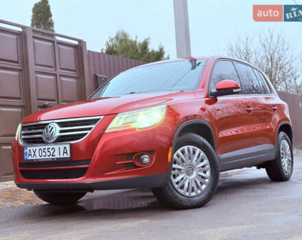 Червоний Фольксваген Тігуан, об'ємом двигуна 1.98 л та пробігом 218 тис. км за 8999 $, фото 1 на Automoto.ua