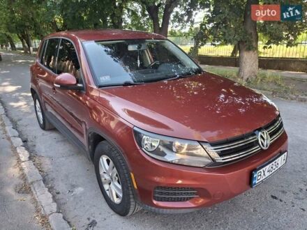 Фольксваген Тигуан 2012 в Каменце-Подольском на Automoto.ua Красный Фольксваген Тигуан, объемом двигателя 1.98 л и пробегом 276 тыс. км за 10300 $, фото 1 на Automoto.ua