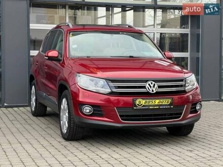 Червоний Фольксваген Тігуан, об'ємом двигуна 1.98 л та пробігом 120 тис. км за 11800 $, фото 1 на Automoto.ua