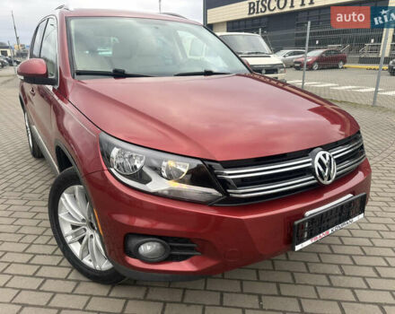 Красный Фольксваген Тигуан, объемом двигателя 2 л и пробегом 286 тыс. км за 8499 $, фото 1 на Automoto.ua
