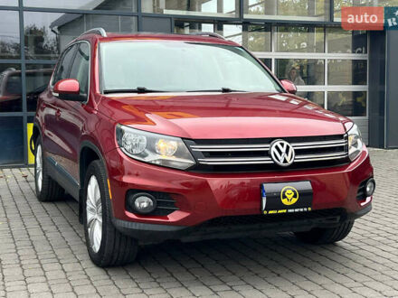 Красный Фольксваген Тигуан, объемом двигателя 1.98 л и пробегом 175 тыс. км за 13800 $, фото 1 на Automoto.ua