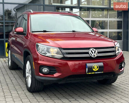 Красный Фольксваген Тигуан, объемом двигателя 1.98 л и пробегом 175 тыс. км за 13800 $, фото 1 на Automoto.ua