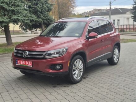 Красный Фольксваген Тигуан, объемом двигателя 2 л и пробегом 178 тыс. км за 12300 $, фото 1 на Automoto.ua