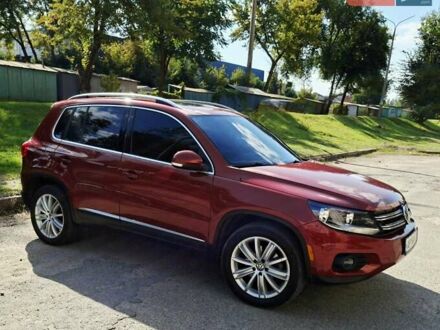 Красный Фольксваген Тигуан, объемом двигателя 1.98 л и пробегом 161 тыс. км за 14900 $, фото 1 на Automoto.ua