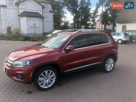 Красный Фольксваген Тигуан, объемом двигателя 2 л и пробегом 177 тыс. км за 12700 $, фото 1 на Automoto.ua