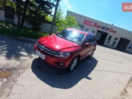 Красный Фольксваген Тигуан, объемом двигателя 1.98 л и пробегом 101 тыс. км за 15500 $, фото 1 на Automoto.ua