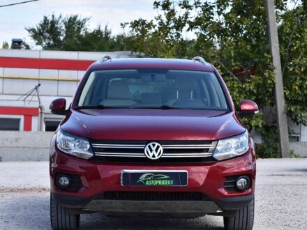 Красный Фольксваген Тигуан, объемом двигателя 2 л и пробегом 101 тыс. км за 15400 $, фото 1 на Automoto.ua