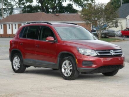 Червоний Фольксваген Тігуан, об'ємом двигуна 2 л та пробігом 79 тис. км за 7200 $, фото 1 на Automoto.ua