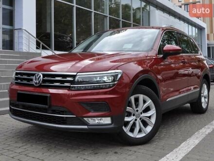 Червоний Фольксваген Тігуан, об'ємом двигуна 1.98 л та пробігом 151 тис. км за 21900 $, фото 1 на Automoto.ua