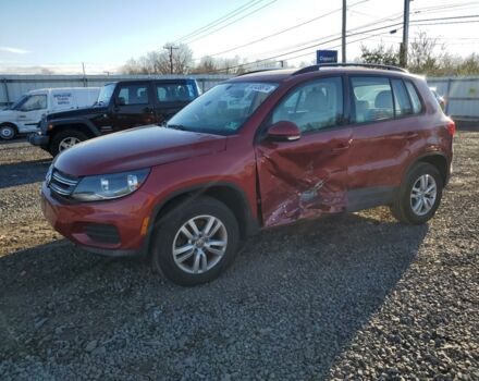 Красный Фольксваген Тигуан, объемом двигателя 2 л и пробегом 73 тыс. км за 10000 $, фото 1 на Automoto.ua