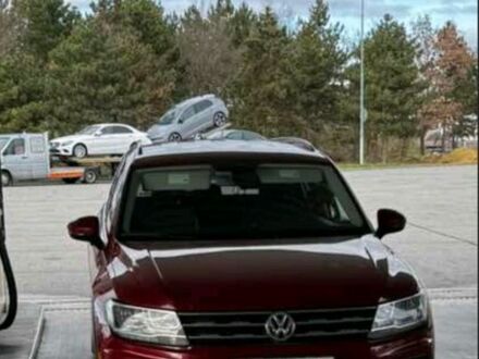 Красный Фольксваген Тигуан, объемом двигателя 2 л и пробегом 90 тыс. км за 367 $, фото 1 на Automoto.ua